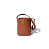 The Bennet Bucket Bag In Cognac Suede 