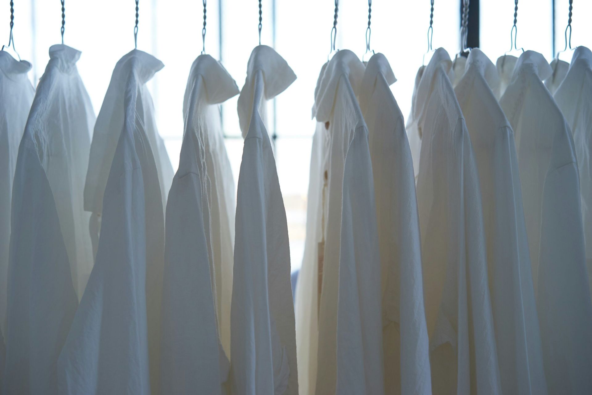 white shirts hanging