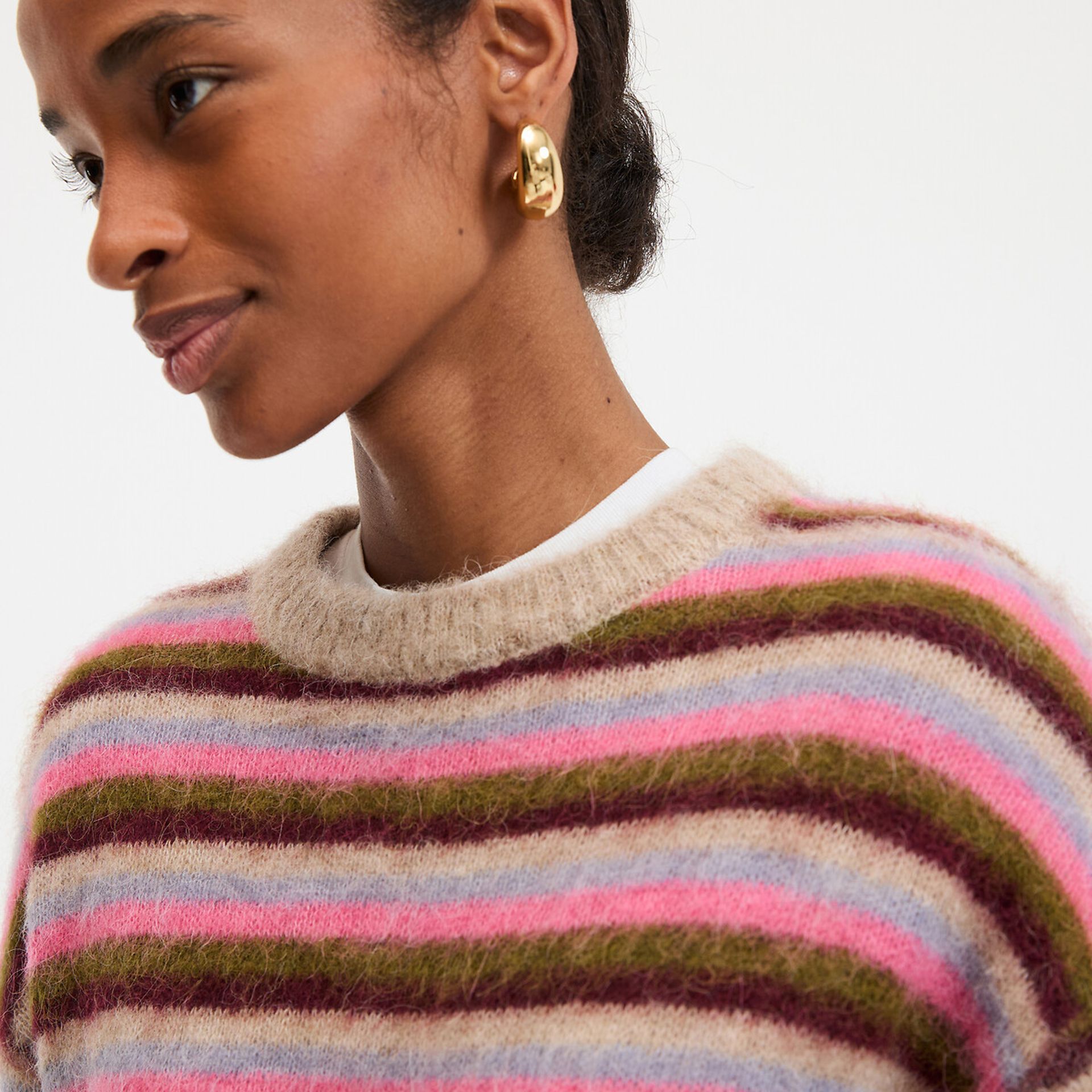 model wearing striped jumper