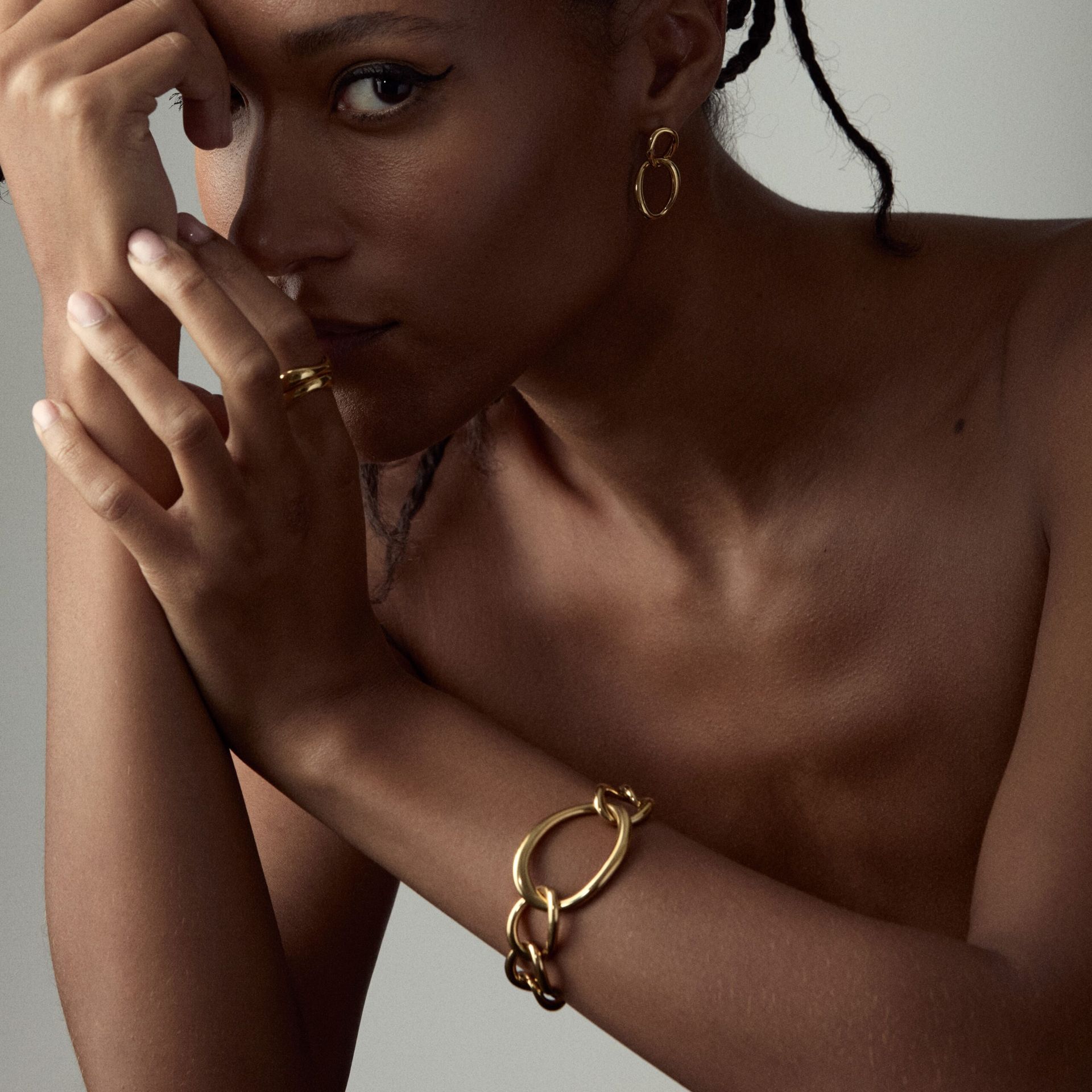 model wearing dinny hall wave jewellery collection