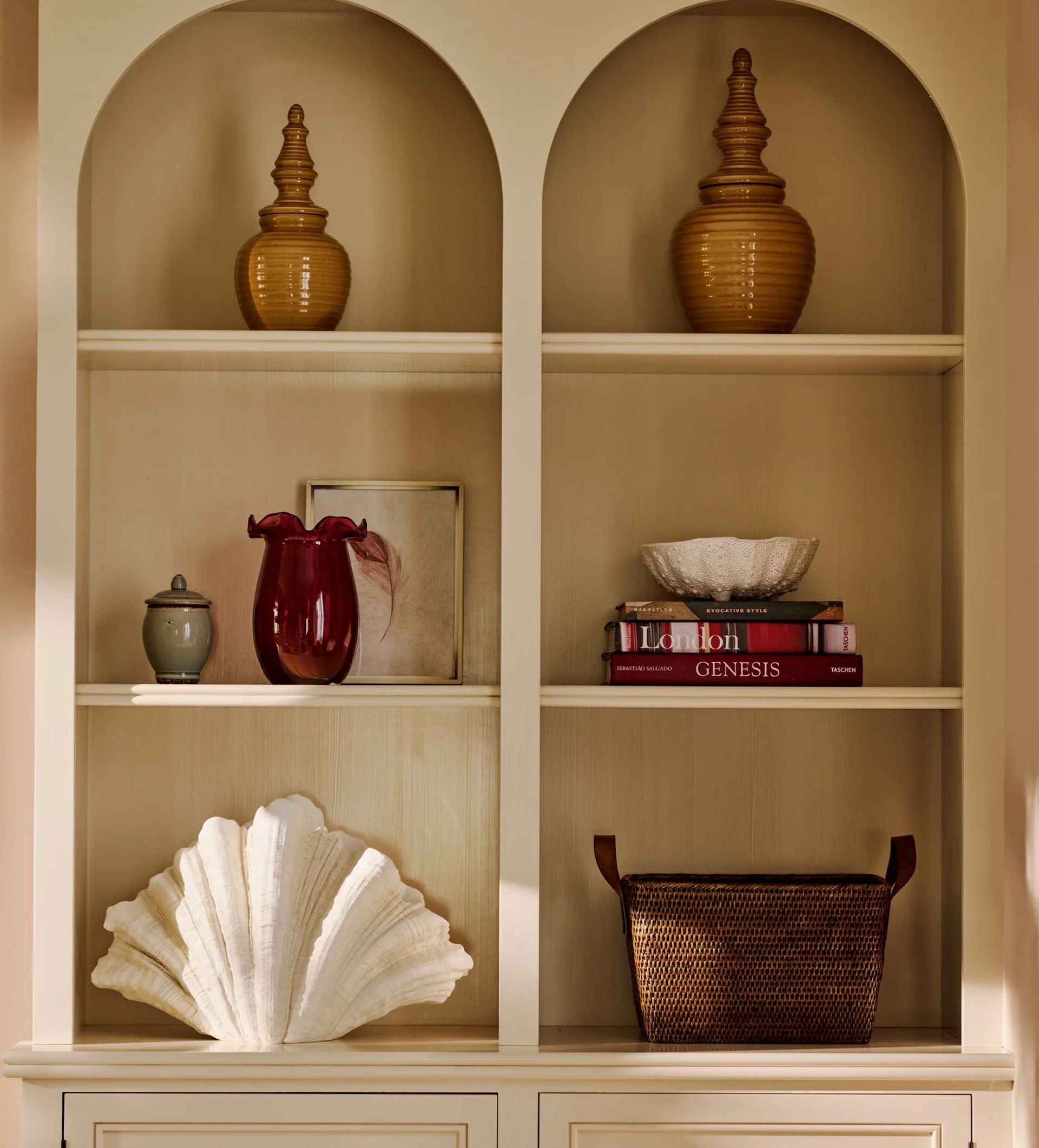 Venusia Clam Shell - Off White on open shelving with other accessories and vases