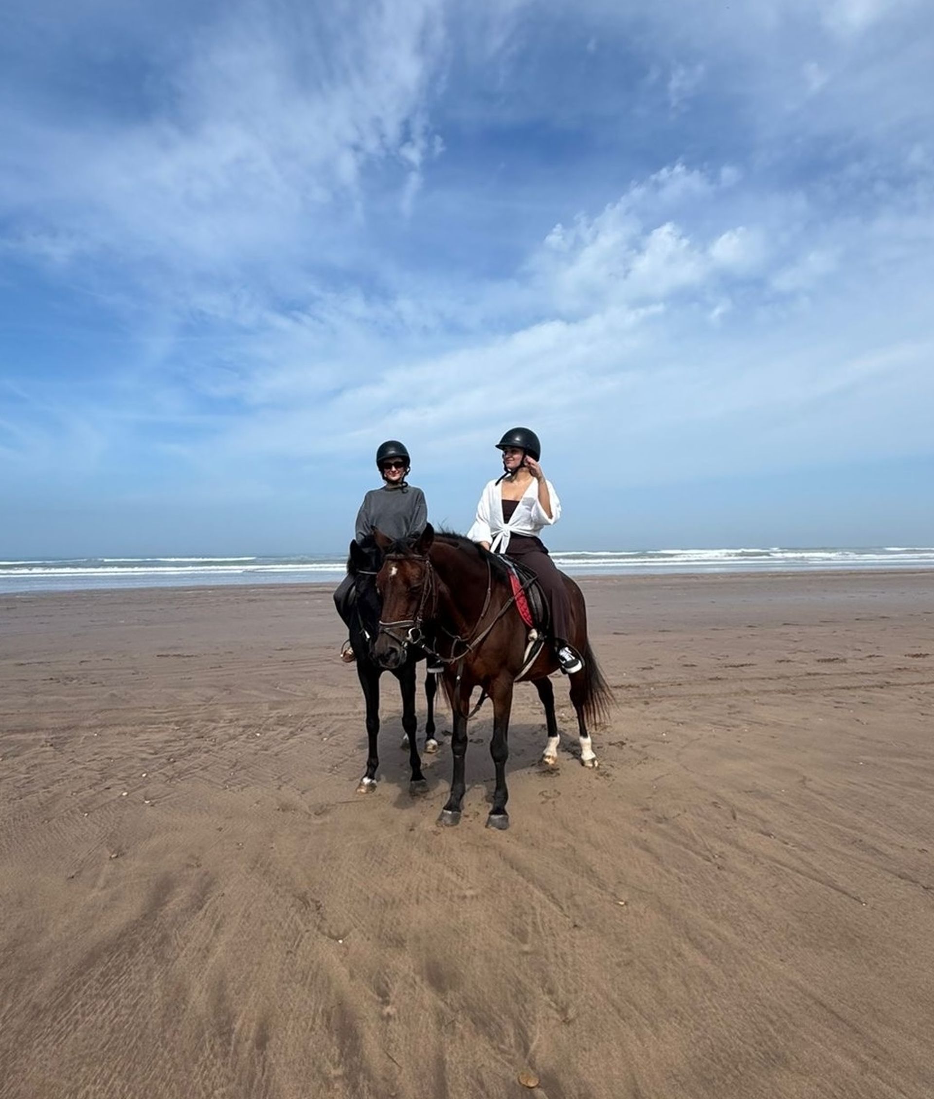 horse riding on beach