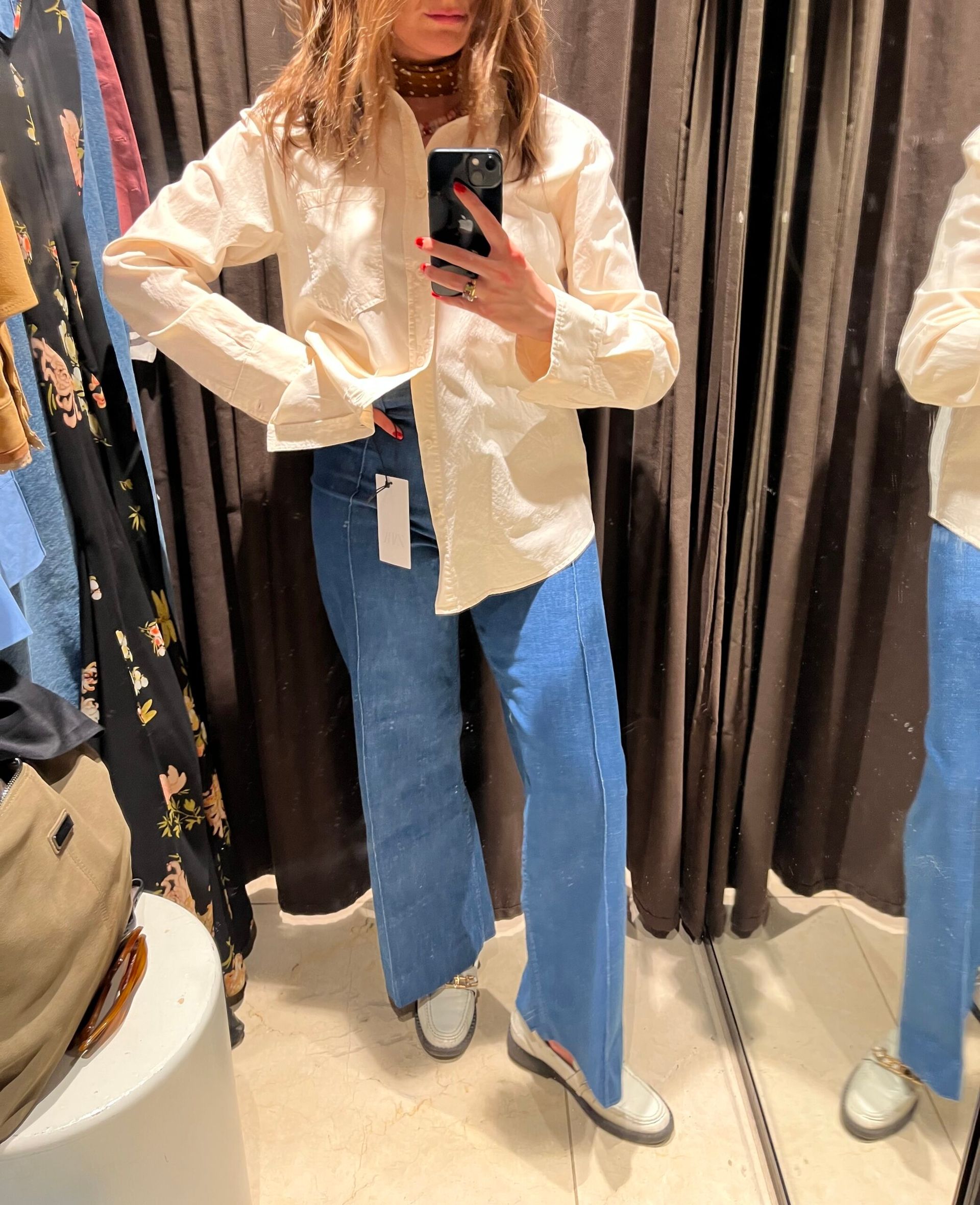 astrid wearing lemon shirt and jeans