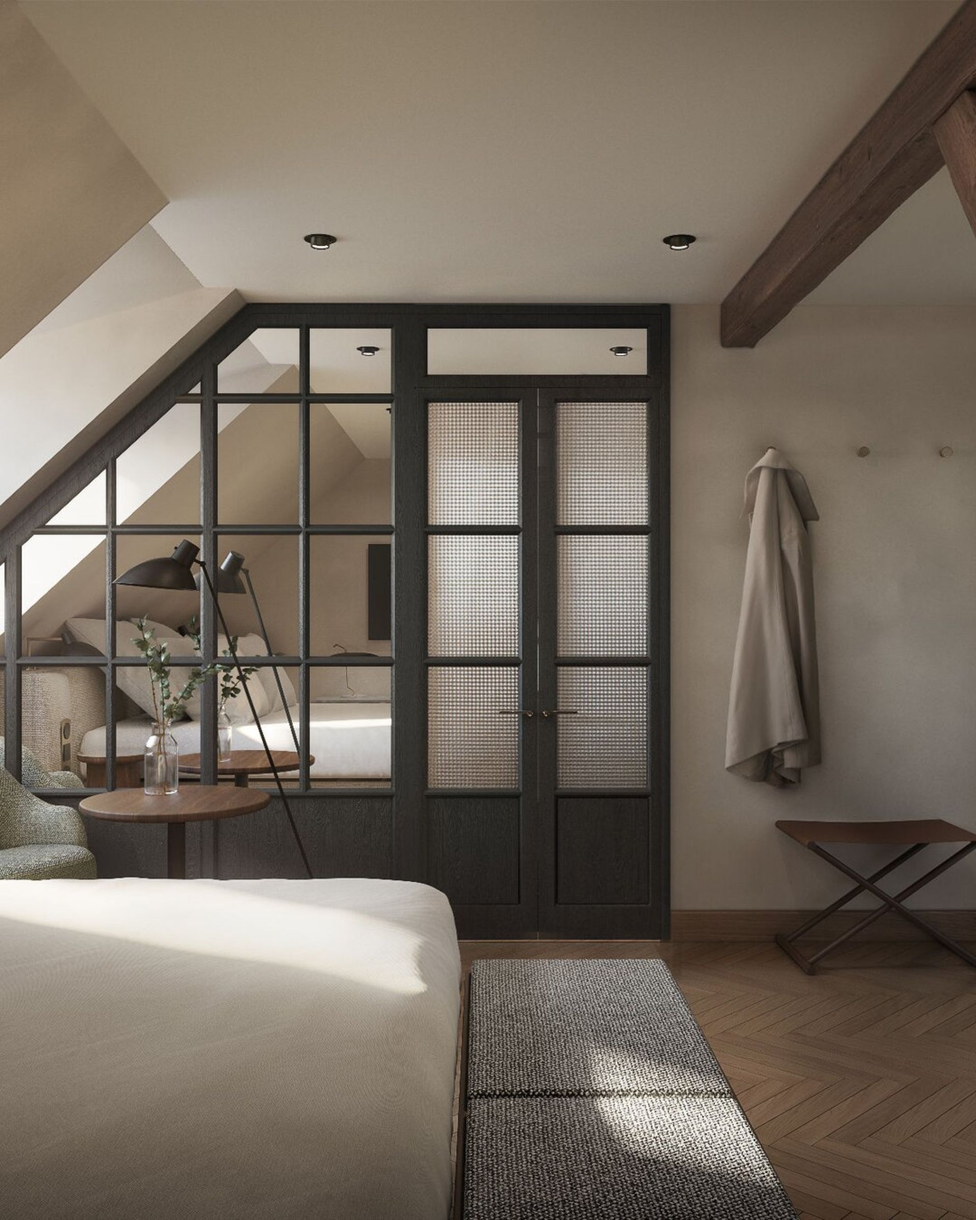 A cosy, modern bedroom at Villa Copenhagen with a sloped ceiling, glass-panelled double doors, neutral tones, white bedding, wooden floor, and minimal decor—a perfect retreat for your 2026 travel plans.