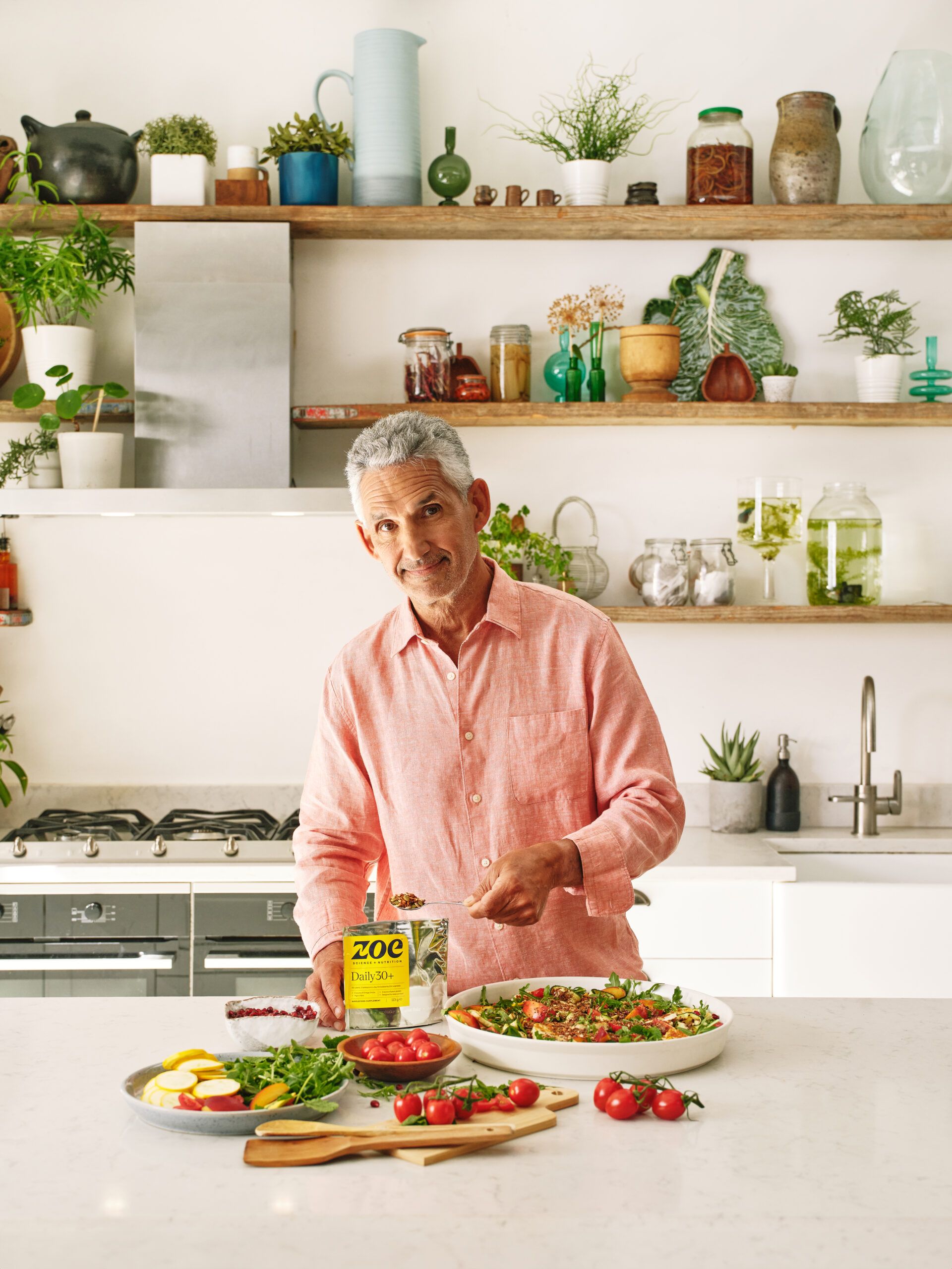 Tim Spector in kitchen using daily 30+ supplement