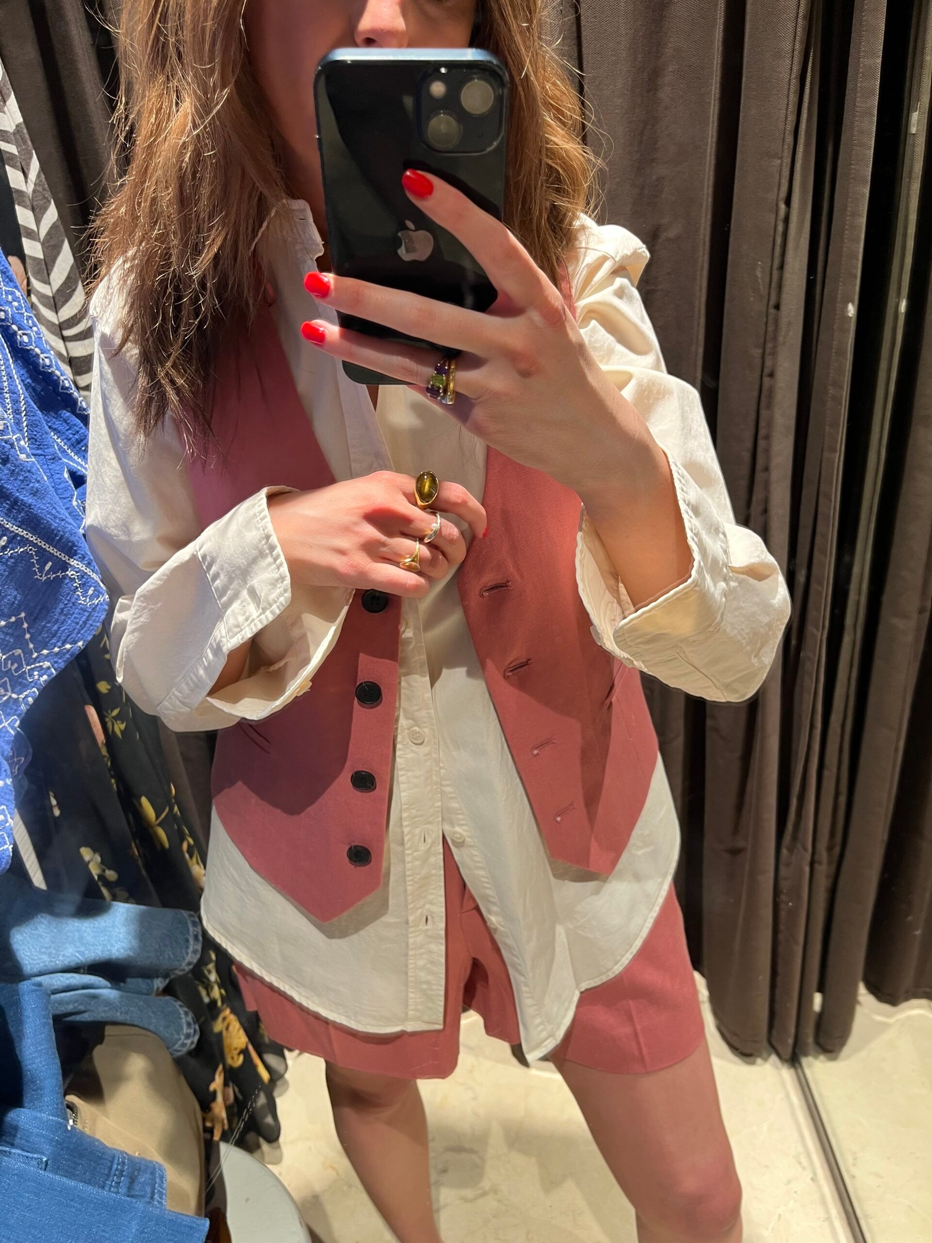 astrid wearing pink waistcoat and shorts