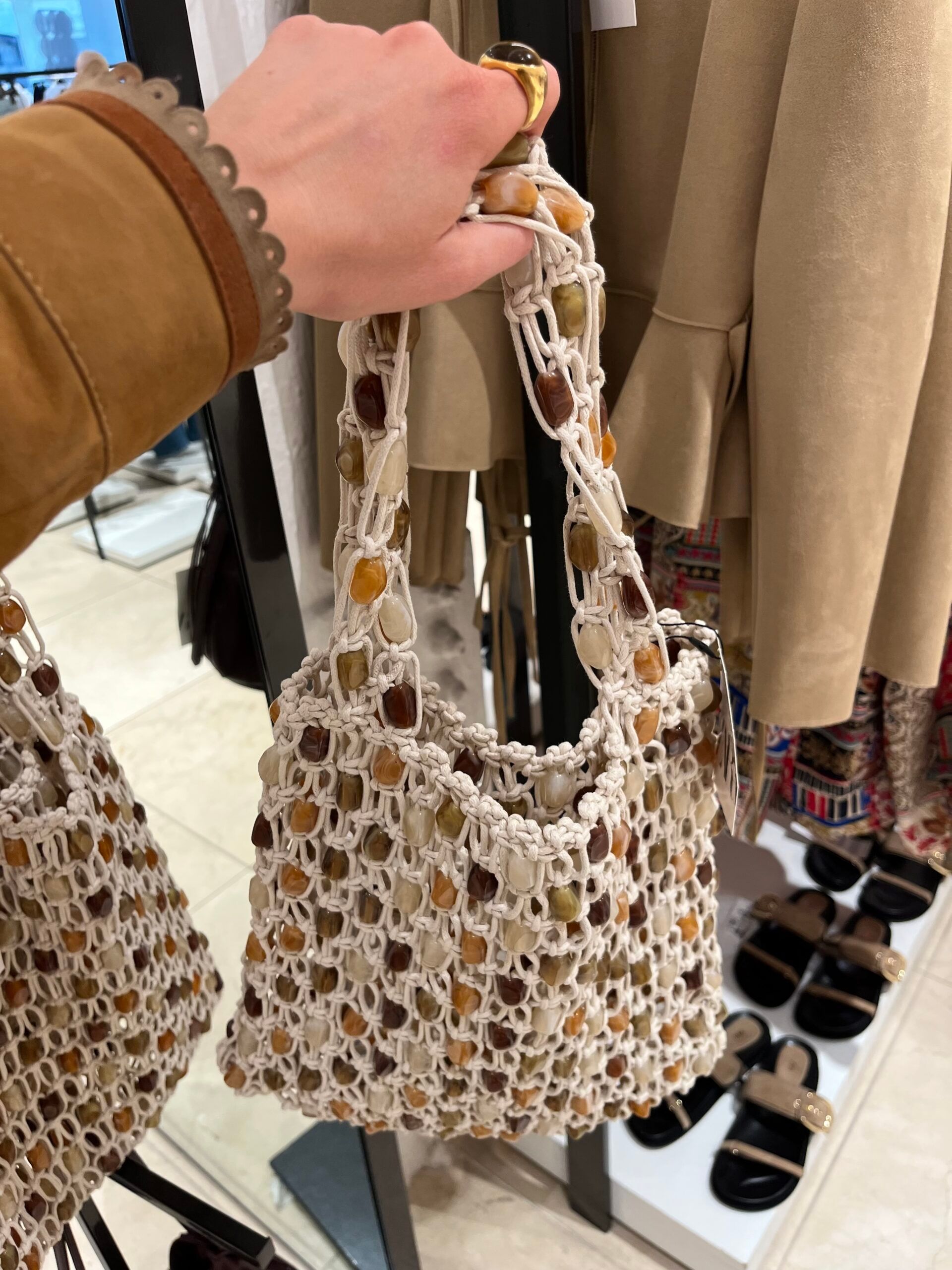 holding string bag with beads