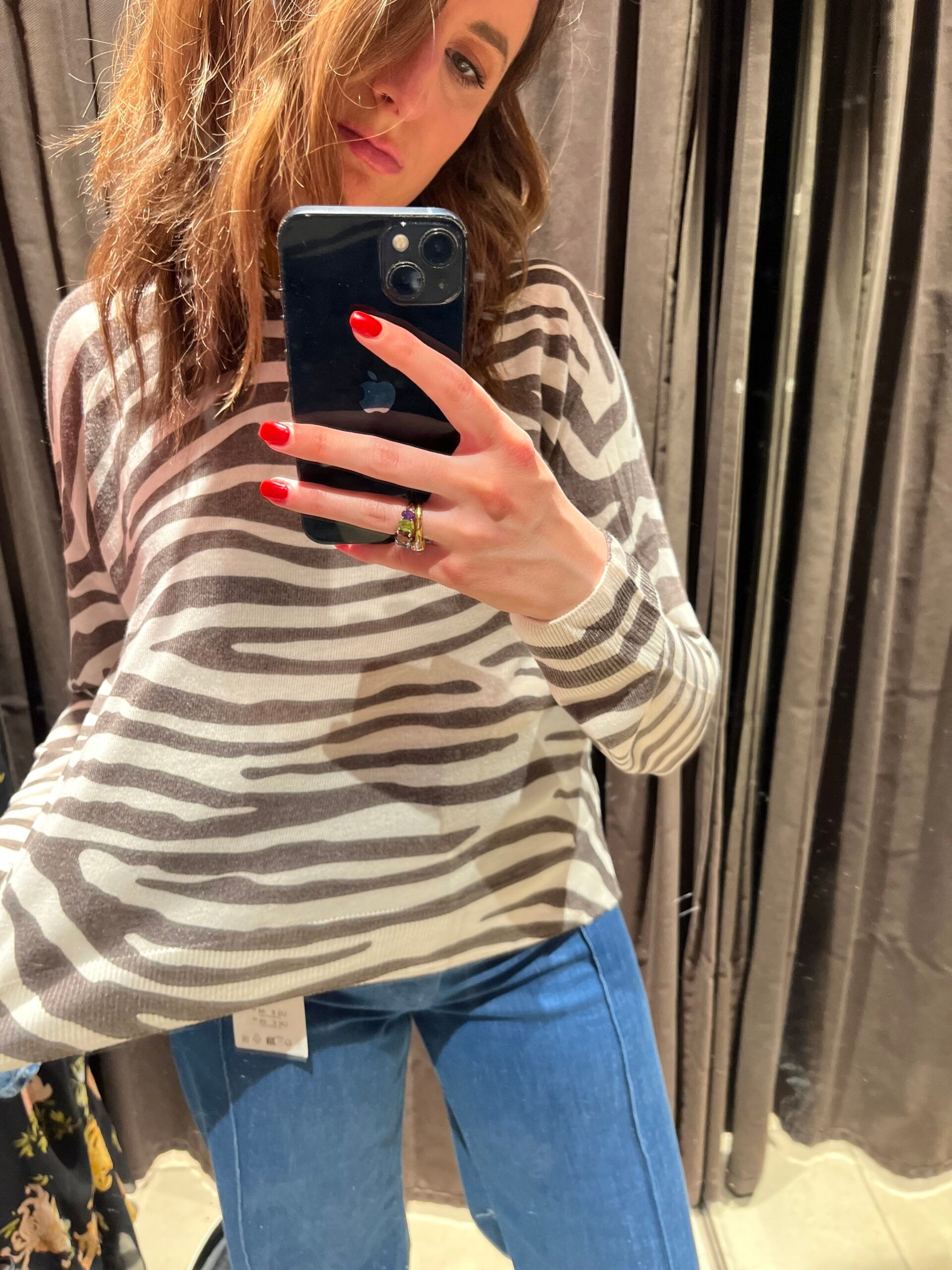 Astrid wears zebra top