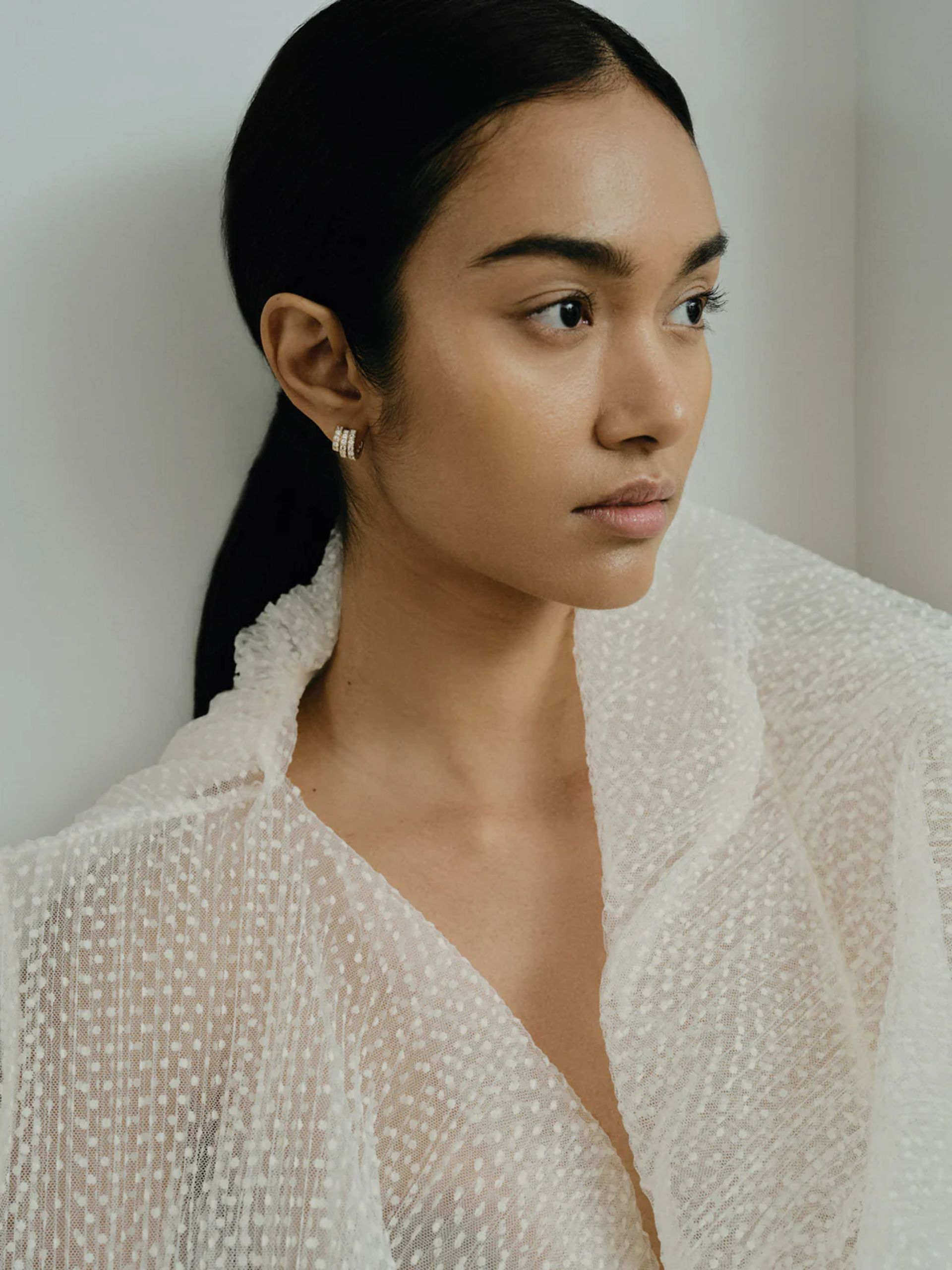 model wearing earrings by by pariah 