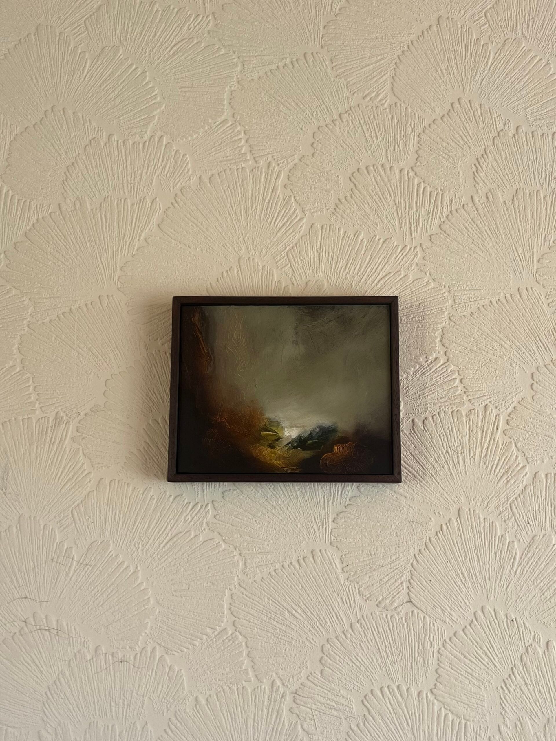 painting by andrew carr against shell wallapaper