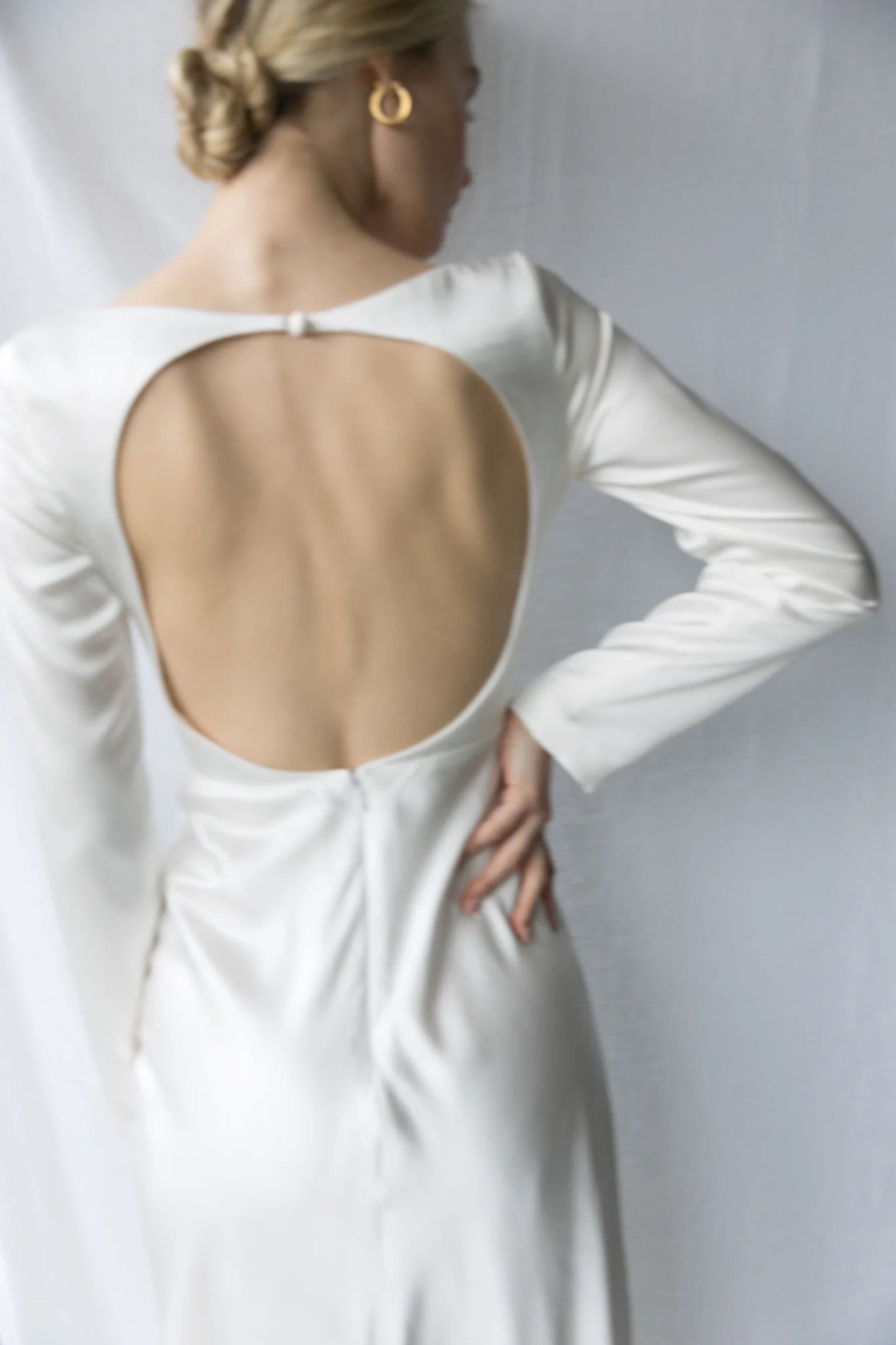 wedding dress from back with cut out 