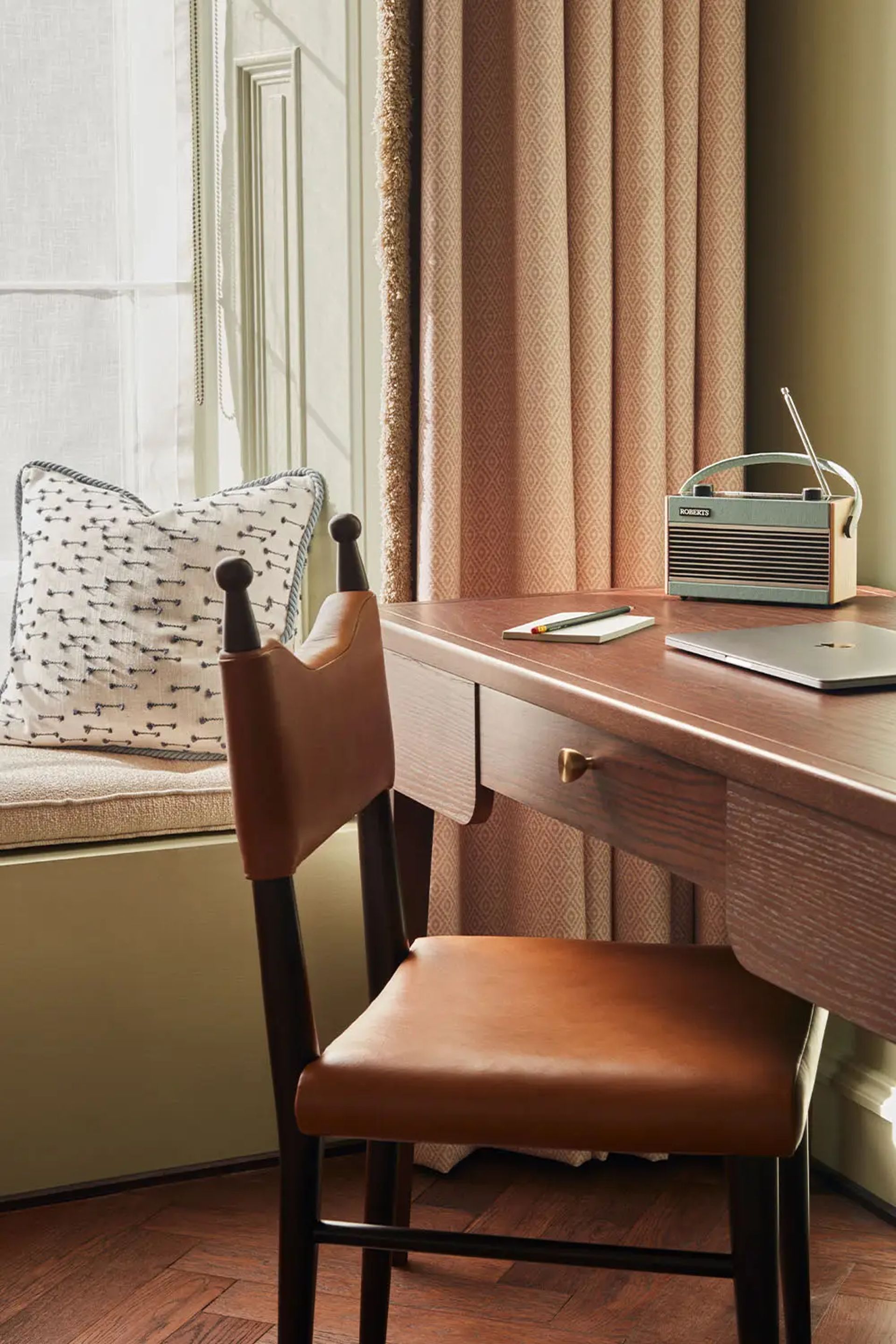 desk in the bedroom of hoxton hotel
