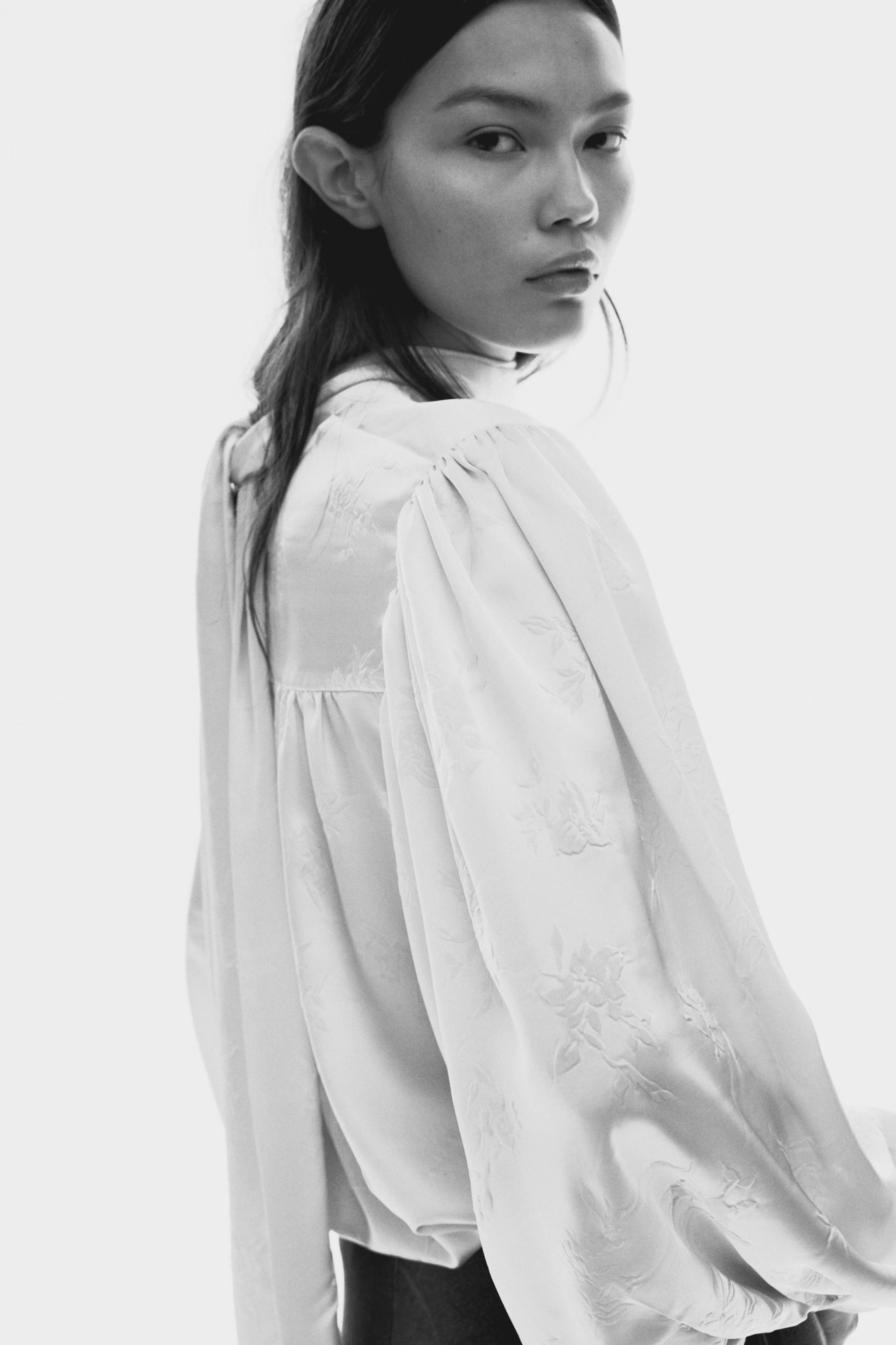 model wearing blouse