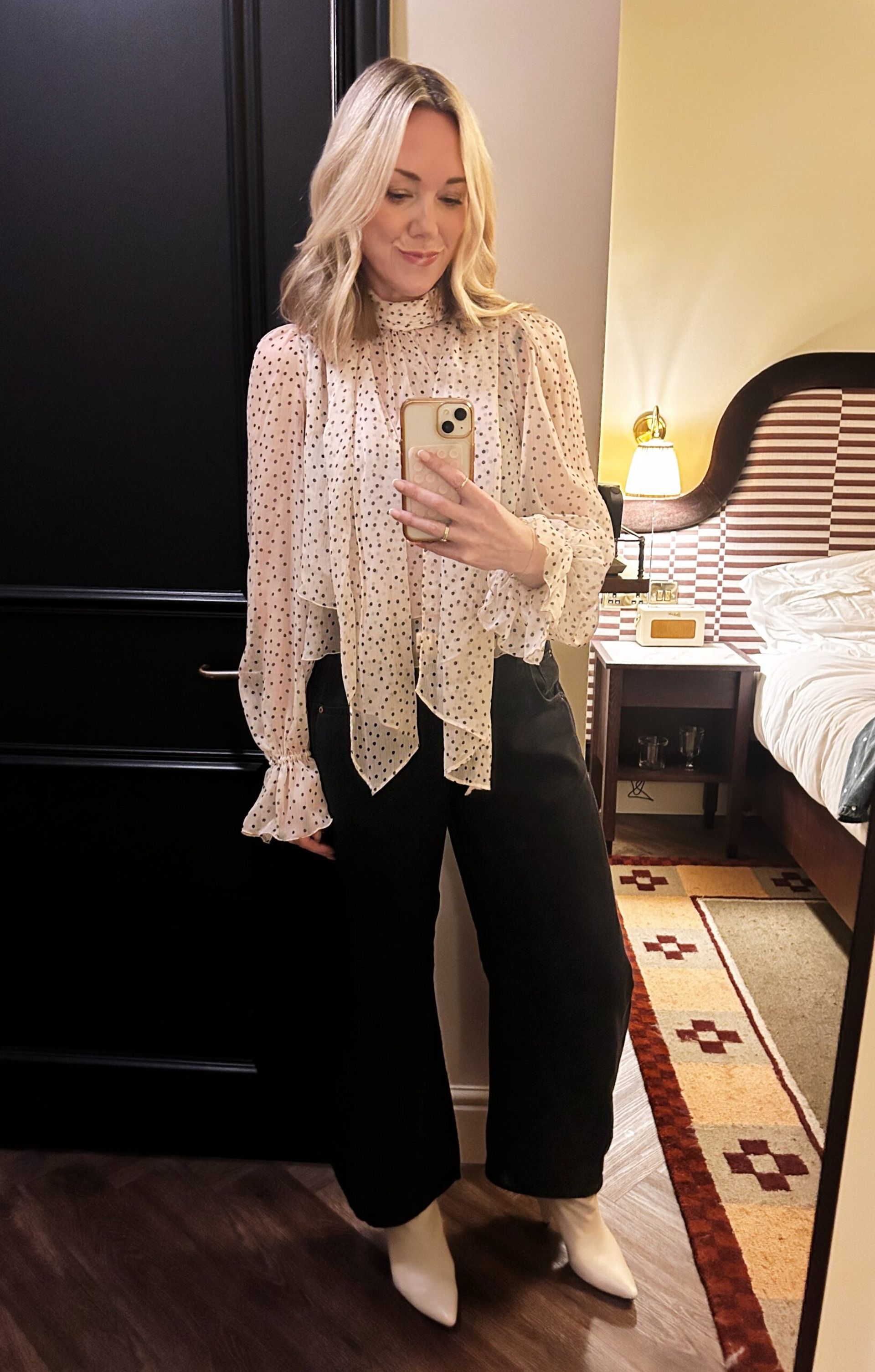 style editor wearing polka dots