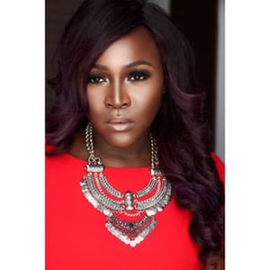 Naomi M. Adenuga