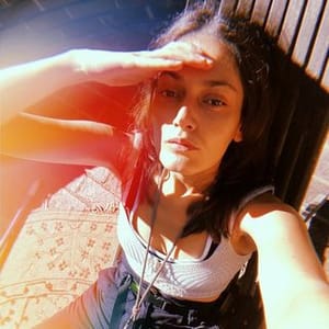 Maria J Baez