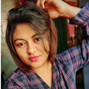 Nisha J