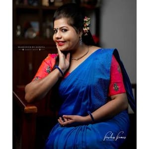 Sneha Sreekumar
