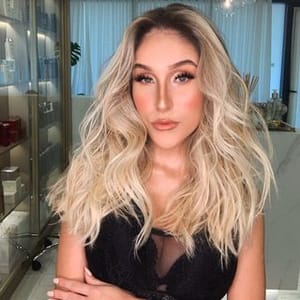 Caroln Belini