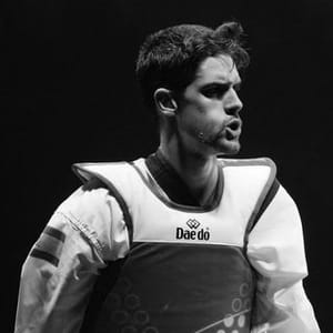 J P