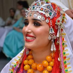 Mme Hania Benmguild