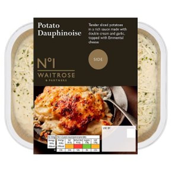 A Waitrose No1 Potato Dauphinoise ready meal in clear packaging with a label showing a baked potato dish topped with cheese—perfect for Easter entertaining. Nutrition information and ingredients are clearly visible on the front.