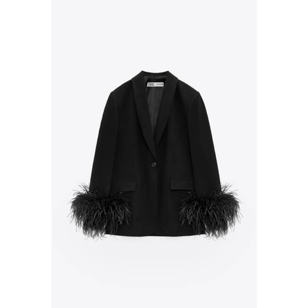 BLAZER WITH POCKETS AND FEATHER TRIMS