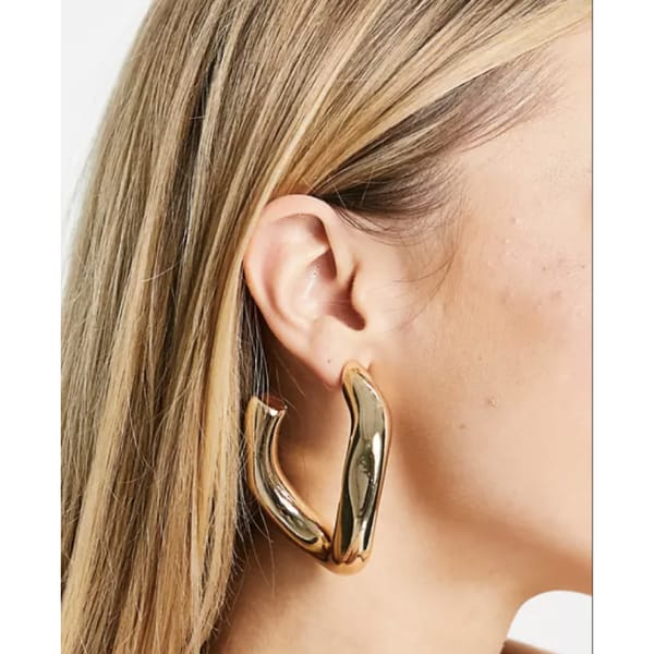ASOS DESIGN hoop earring with large twist link design in gold tone