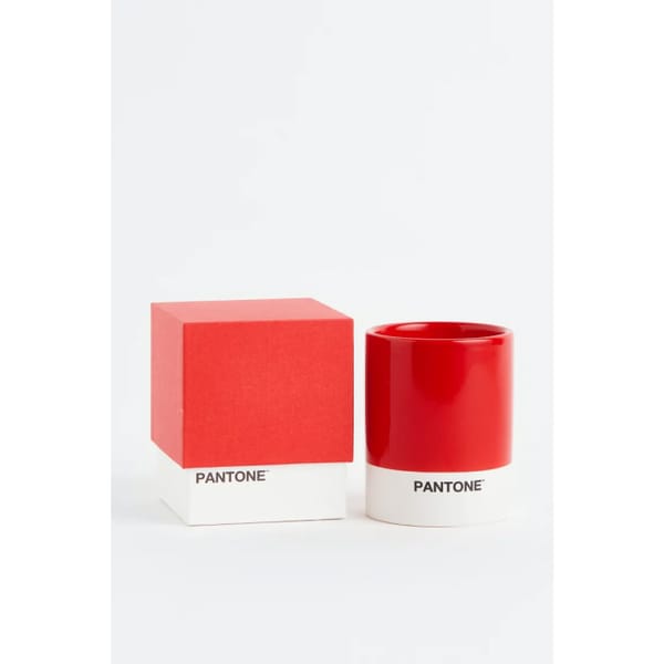 Scented candle in a holder in bright red _ plum noir