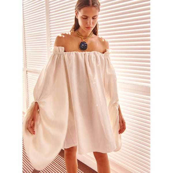 piece of white Kendra Mini Dress