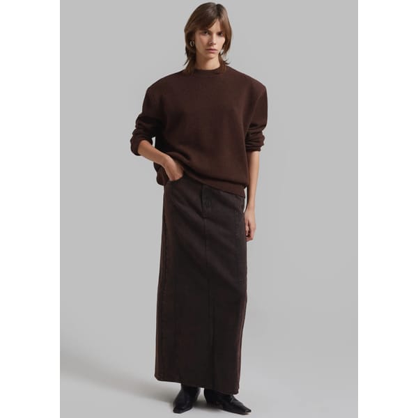 model wears brown skirt and jumper