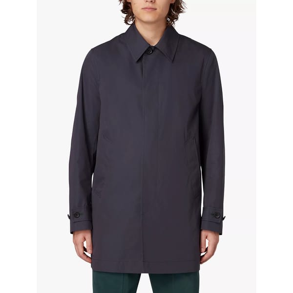 model wears navy trench