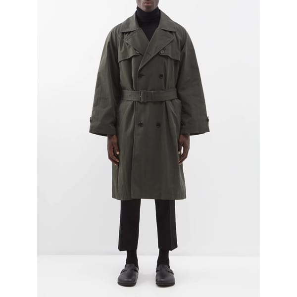 model wears dark green RAEY Oversized cotton-blend trench coat