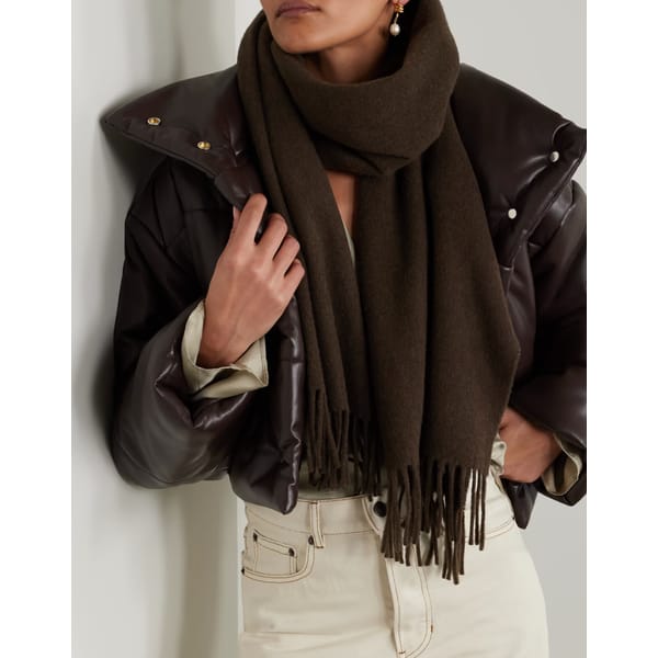 model wears brown TOTEME Fringed wool scarf