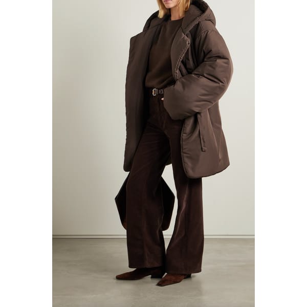 model wearing brown NORMA KAMALI sleeping Bag hooded padded shell coat