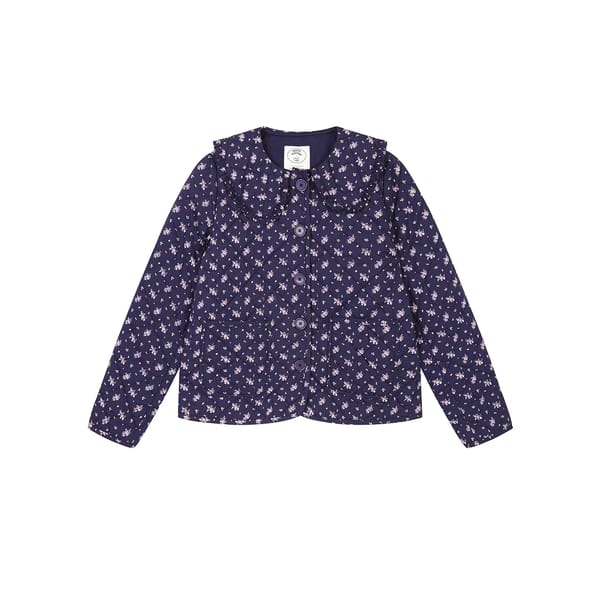 quilted jacket in navy floral print.