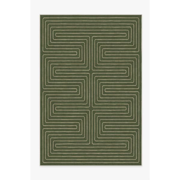 green rug with geometric print