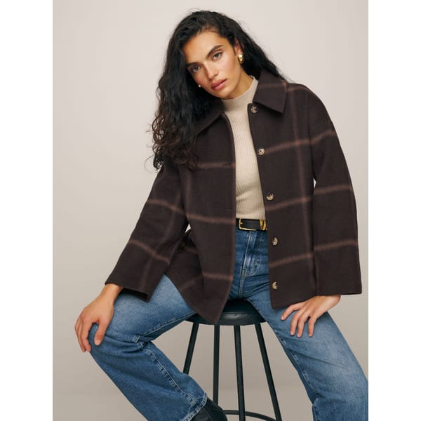 model wears jeans and the reformation Rocky Oversized Shirt Jacket