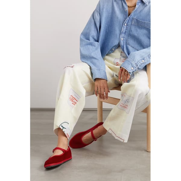 model wears Grosgrain-trimmed velvet Mary Jane slippers