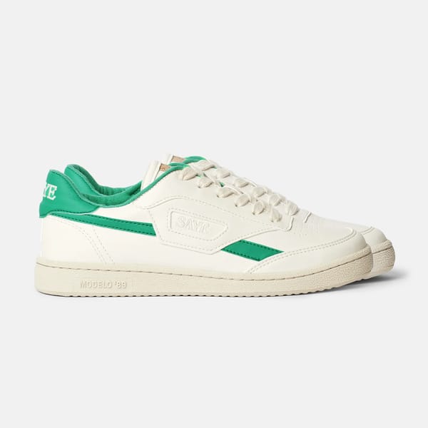white and green trainers