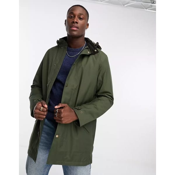 MALE MODEL WEARING BARBOUR GREEN JACKET