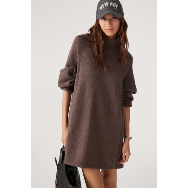 model wears short brown knitted dress