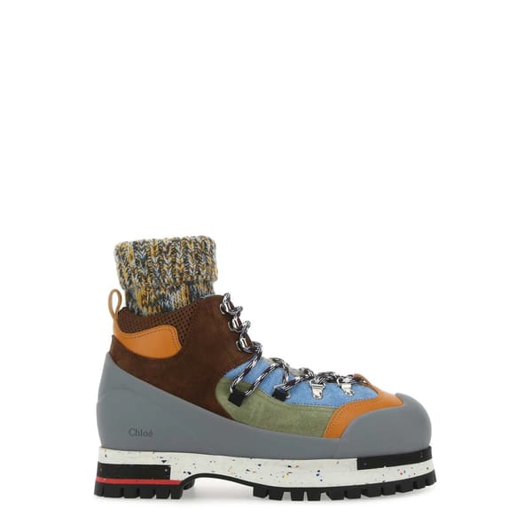 grey, brown and orange hiking boot
