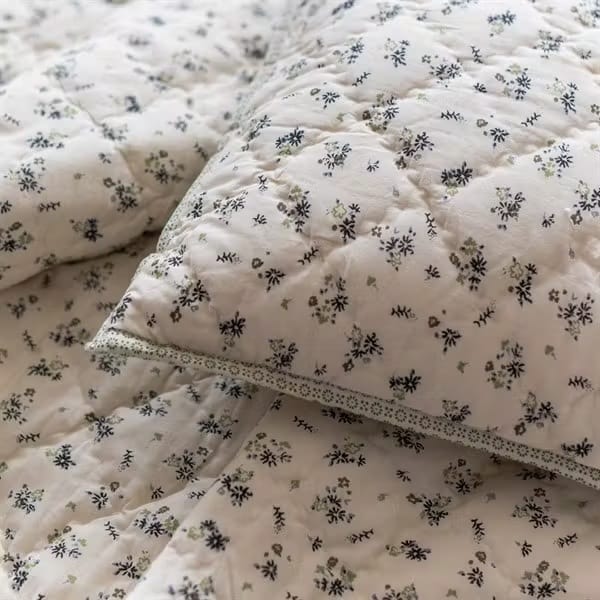 blue ditsy floral print bedspread