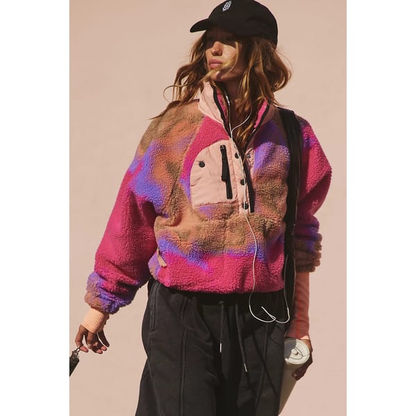 model wears pink and purple fleece pullover