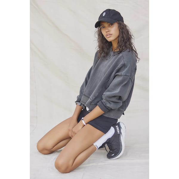 model in black sweatshirt