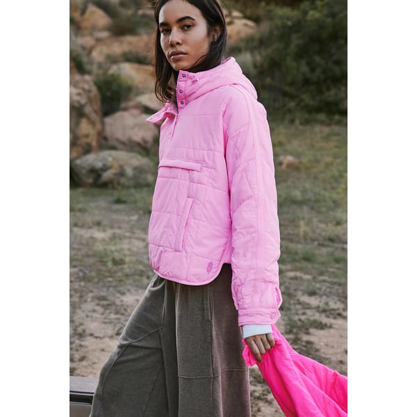 model wears pink puffer