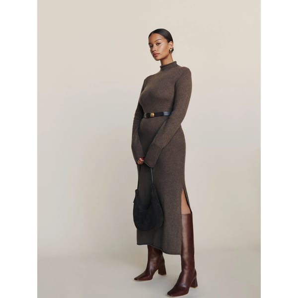 model wears brown knitted dress