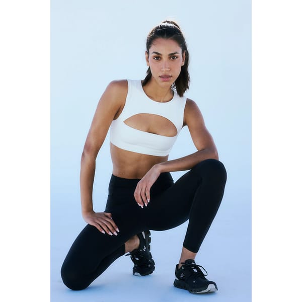 model wears white sports bra