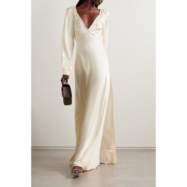 model wears Fiora broderie anglaise-trimmed silk-satin maxi dress